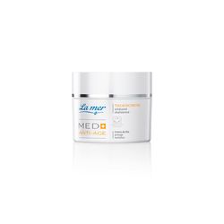 Eine weiße Dose La mer Tagescreme mit Anti-Age-Aufschrift.